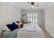 Bedroom with a desk, a window with shutters, and cozy interior design at 2638 Dilworth Heights Ln, Charlotte, NC 28209