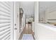 Inviting foyer with hardwood floors, staircase, and open view into the living spaces at 2638 Dilworth Heights Ln, Charlotte, NC 28209