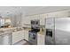 Well-equipped kitchen with stainless steel appliances, granite countertops, and ample cabinetry at 2638 Dilworth Heights Ln, Charlotte, NC 28209