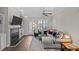 Comfortable living room with fireplace, hardwood floors, and cozy seating arrangements at 2638 Dilworth Heights Ln, Charlotte, NC 28209