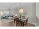 Combined living and dining spaces with hardwood flooring and neutral decor at 2638 Dilworth Heights Ln, Charlotte, NC 28209