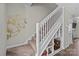 Stairway with carpeted steps and built-in shelving at 2638 Dilworth Heights Ln, Charlotte, NC 28209