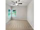 Bright bedroom with carpet floors and natural light from windows at 305 Augustus Ln, Mount Holly, NC 28120