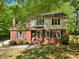 Charming two-story home with a well-maintained lawn and inviting curb appeal at 308 Greenwood Pl, Belmont, NC 28012