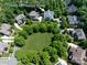 Aerial view of 3301 McPherson Street home with large lawn surrounded by mature trees at 3301 Mcpherson St, Waxhaw, NC 28173