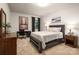 Comfortable bedroom showcasing a bed, desk, and tasteful decor at 3301 Mcpherson St, Waxhaw, NC 28173