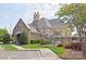 Elegant clubhouse exterior with stone and brick accents, offering community gathering space and a welcoming entrance at 3301 Mcpherson St, Waxhaw, NC 28173