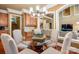 Elegant dining area with a glass-top table and stylish chandelier at 3301 Mcpherson St, Waxhaw, NC 28173