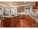 Well-appointed kitchen with a central island, stainless steel appliances at 3301 Mcpherson St, Waxhaw, NC 28173