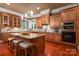 Spacious kitchen featuring an island with seating and updated appliances at 3301 Mcpherson St, Waxhaw, NC 28173