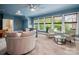 Bright living room featuring large windows and cozy furniture at 3301 Mcpherson St, Waxhaw, NC 28173