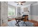Bright home office with a fireplace, hardwood floors, and ample natural light at 3301 Mcpherson St, Waxhaw, NC 28173