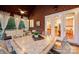 Covered outdoor patio featuring a large table, chairs, and access to the kitchen at 3301 Mcpherson St, Waxhaw, NC 28173