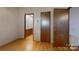 Empty bedroom featuring wood-look flooring, a ceiling fan, and neutral paint at 3379 Appletree Ct, Vale, NC 28168