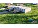 Charming single-story home with a metal roof, wooden deck, and well-maintained lawn at 3379 Appletree Ct, Vale, NC 28168