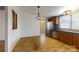 Kitchen with stainless steel appliances, wood cabinets and hardwood floors at 3379 Appletree Ct, Vale, NC 28168