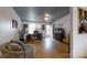 Living room featuring a couch, desk, and hardwood floors at 3379 Appletree Ct, Vale, NC 28168