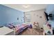 A unique and whimsical bedroom features colorful decor and stylish furniture at 3623 Danvers St, Charlotte, NC 28213