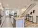 Spacious kitchen with a large island, stainless steel appliances and hardwood flooring at 4132 Skyboat Cir, Fort Mill, SC 29715