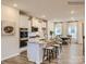 Bright kitchen featuring a central island, granite countertops and barstool seating at 4132 Skyboat Cir, Fort Mill, SC 29715