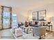 Comfortable living room features modern decor and ample natural light at 4140 Skyboat Cir, Fort Mill, SC 29715