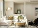 Comfortable living room with a sectional sofa, stylish throw pillows, a round coffee table, and a modern armchair at 4539 Potters Wheel Dr, Fort Mill, SC 29715