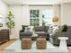 Bright living room features a large gray couch, woven ottomans, and large windows at 4567 Potters Wheel Dr, Fort Mill, SC 29715