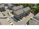 Aerial view of townhome community showcasing modern architecture, parking, and green spaces at 5005 Sovereignty Ct, Charlotte, NC 28205