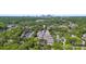 An aerial perspective showcasing the townhome community and surrounding greenery near the cityscape at 5005 Sovereignty Ct, Charlotte, NC 28205