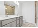 Modern bathroom with double vanity, tiled shower, and stylish finishes at 5005 Sovereignty Ct, Charlotte, NC 28205