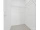 Clean, white walk-in closet with wire shelving offering ample storage space at 5005 Sovereignty Ct, Charlotte, NC 28205