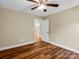 Bedroom features wood floor, ceiling fan and recessed lighting at 575 Hill Rd, Lincolnton, NC 28092