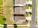 Aerial view of homes featuring fenced yards, landscaping, and driveway at 609 Kahana River Rd, Fort Mill, SC 29715