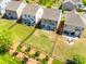 Aerial view of homes featuring fenced backyards and green spaces, perfect for outdoor living at 609 Kahana River Rd, Fort Mill, SC 29715