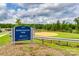 View of Banks Athletic Park featuring baseball field, sign, landscaping, and parking at 609 Kahana River Rd, Fort Mill, SC 29715