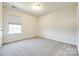 Bedroom with plush carpet, natural light from the window and ceiling light at 609 Kahana River Rd, Fort Mill, SC 29715