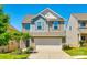 Charming two-story home with a two-car garage, well-maintained lawn, and inviting curb appeal in a Gathering-friendly neighborhood at 609 Kahana River Rd, Fort Mill, SC 29715