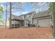 Large backyard with a screened porch, patio, and ample green space at 8013 Sheckler Ln, Matthews, NC 28104