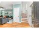 Inviting foyer with hardwood floors and staircase leading to the upper level at 8013 Sheckler Ln, Matthews, NC 28104