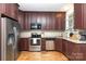 Well-equipped kitchen with stainless steel appliances and granite countertops at 8013 Sheckler Ln, Matthews, NC 28104