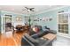 Bright and airy living room and dining area with hardwood floors and neutral paint at 8013 Sheckler Ln, Matthews, NC 28104
