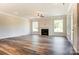 Spacious living room with a fireplace, hardwood floors, recessed lighting, and large windows at Tbd Boomer Ct # 11, Statesville, NC 28677