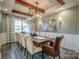 Large dining room featuring elegant lighting, hardwood floors, and wainscoting details at Tbd Boomer Ct # 12, Statesville, NC 28677
