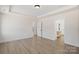 Spacious main bedroom featuring tray ceiling, hardwood floors, and two doorways at Tbd Boomer Ct # 13, Statesville, NC 28677