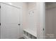 Mud room featuring coat rack, bench and storage next to a door at Tbd Boomer Ct # 13, Statesville, NC 28677