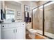 Modern bathroom featuring a glass shower, a white vanity with a black faucet, and a toilet with black and white accents at Tbd Boomer Ct # 14, Statesville, NC 28677