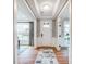 Bright foyer with hardwood floors, white wainscoting, and view to the outside at Tbd Boomer Ct # 14, Statesville, NC 28677