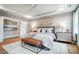 Serene bedroom with tray ceiling, contemporary decor, and hardwood floors at Tbd Boomer Ct # 14, Statesville, NC 28677