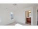 Bright bedroom with two windows and view to bath with lovely wood vanity at Tbd Boomer Ct # 8, Statesville, NC 28677