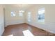 Bright dining room featuring classic trimwork, wood flooring and large windows that provide natural light at Tbd Boomer Ct # 8, Statesville, NC 28677